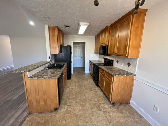 Building Photo - Discover the Perfect Blend of Comfort and ...