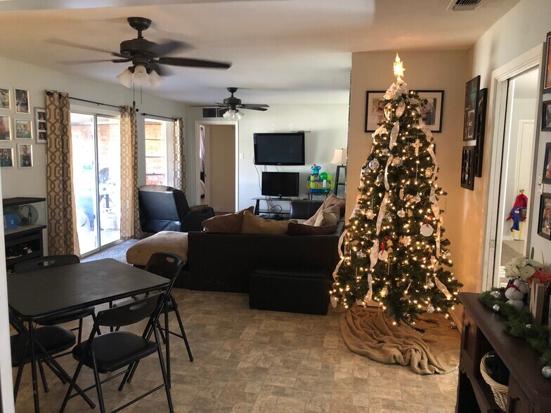 Living room with awesome windows looking into backyard! - 2754 Yale