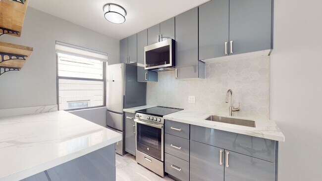 Building Photo - Remodeled modern 1 bedroom end unit, close...