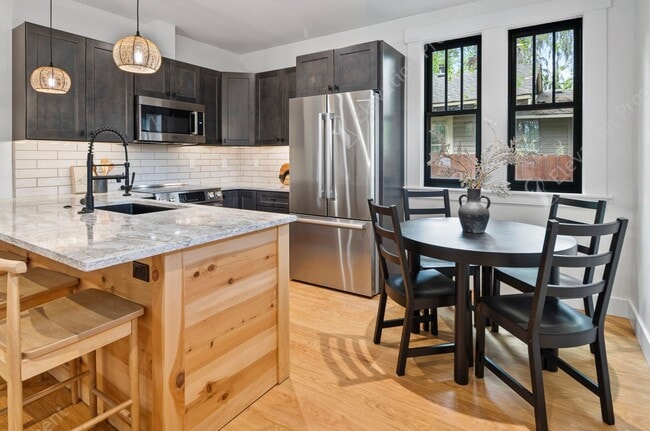 Building Photo - Experience Sustainable Luxury in this Prem...