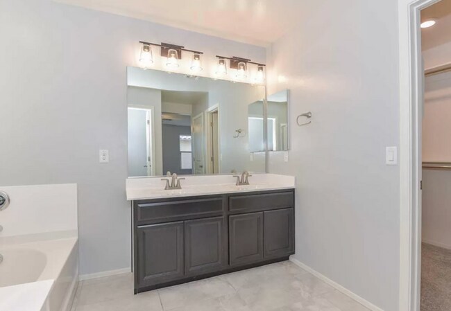 Building Photo - Spacious 2-Story, 3 Bedroom/2.5 Bath Home with 2 Car Garage! Community Pool and Playground!