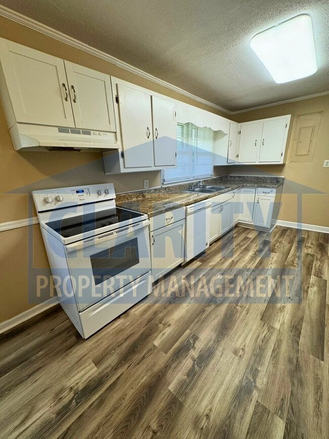 Building Photo - Two bedroom home w/ wrap-around porch!