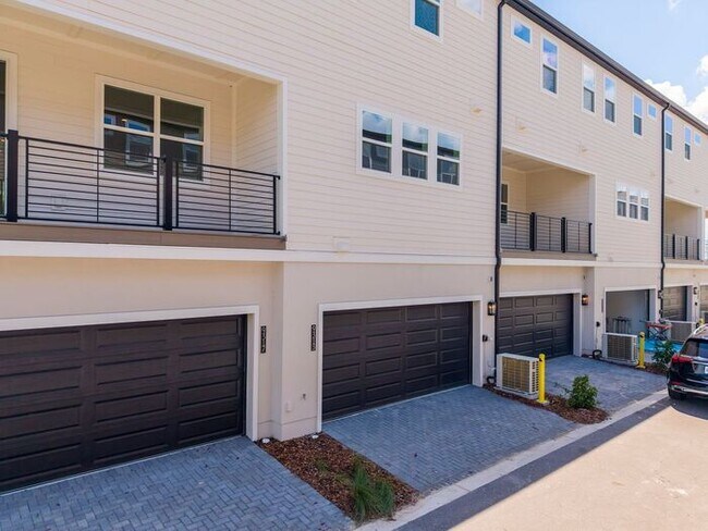 Building Photo - Modern 3-Bedroom 3.5-Bath Townhome with EV Charger, Smart Home Features, 2-Car Garage & Resort-St...