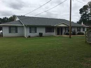 Building Photo - Monthly Paid Rent
