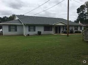 Building Photo - Monthly Paid Rent