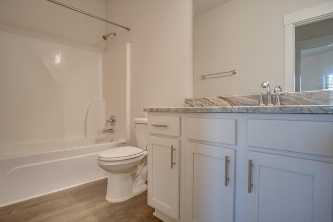 Building Photo - Spacious Cantonment Townhome with Open Layout, 2-Car Garage, Covered Back Porch & Easy Access to ...