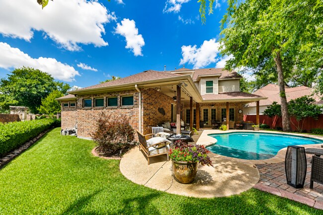 Building Photo - A Gated River Park Estate Where Timeless Tudor Elegance Meets Resort-Style Living
