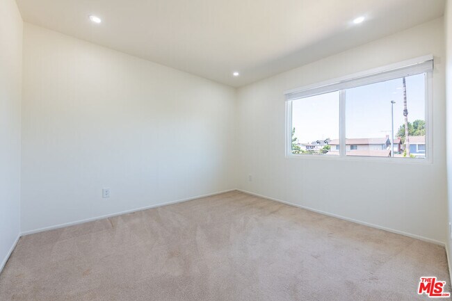 Building Photo - 8324 Beckford Ave