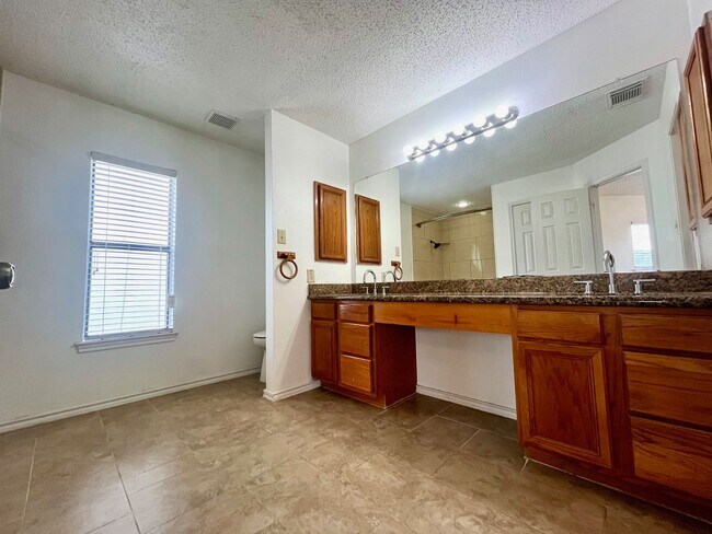 Building Photo - Spacious 3 Bedroom/2.5 Bath home with Large Game Room and Fabulous Deck ~ Move in Ready!