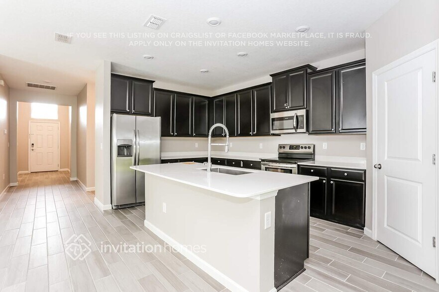 Building Photo - 9848 Lemon Grass Ln