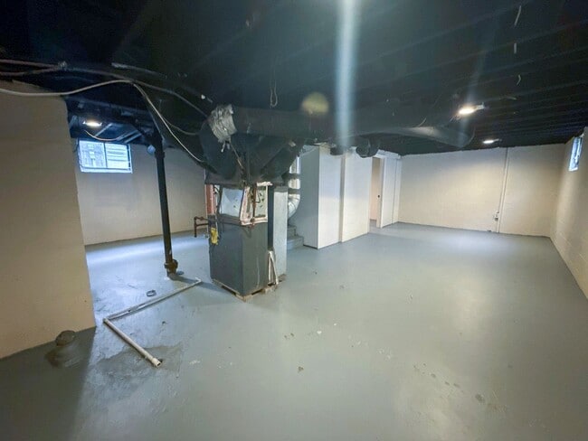 Building Photo - Move-In Ready 2BR Home w/ Refinished Hardwood Floors + Bonus Room Basement!