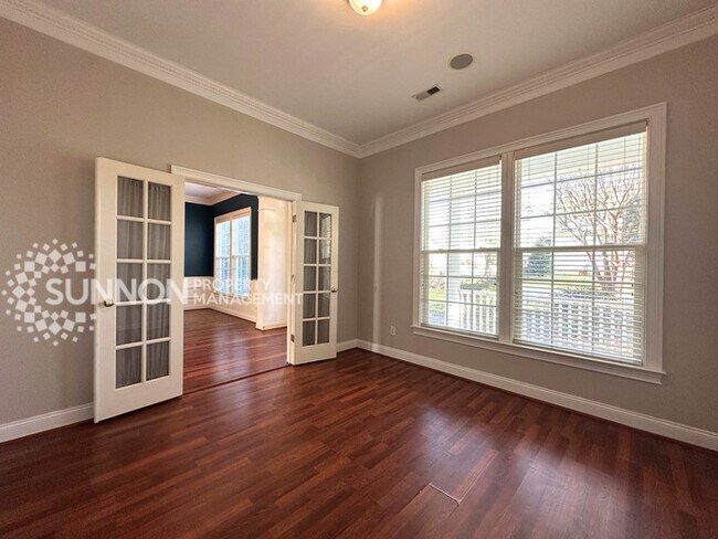 Building Photo - Wooded, Charming 3 Bedroom with Tons of Space