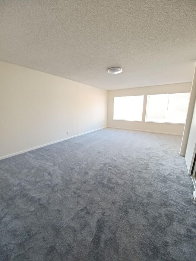 Building Photo - Beautiful 4-Bedroom Home with Spacious Lay...