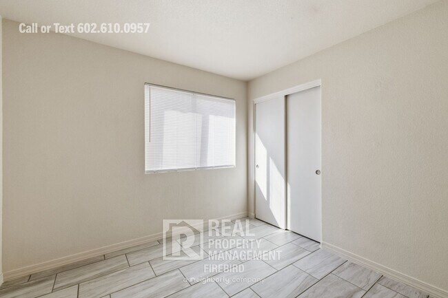 Building Photo - 8563 W Mission Ln