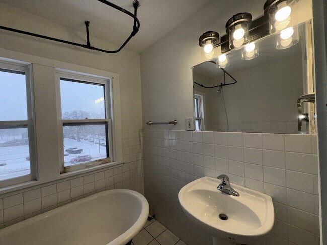 Building Photo - "Charming Studio Gem with Office and Hardwood Floors in the Heart of Minneapolis!"