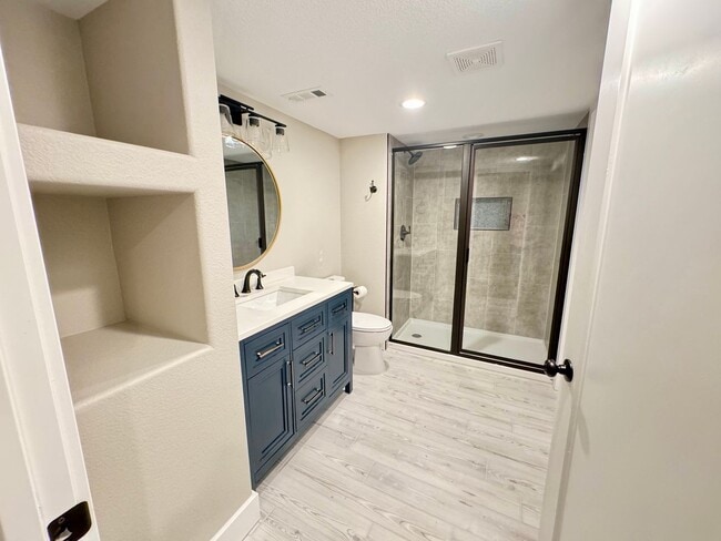 Building Photo - 4 BEDROOM, 3 BATHROOM TWINHOME WITH 2 CAR ATTACHED GARAGE IN NORTH CHEYENNE