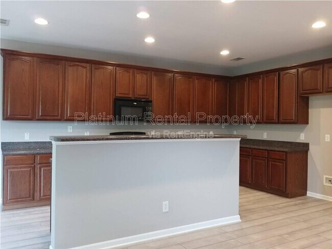 Building Photo - 6205 Park Leaf Walk