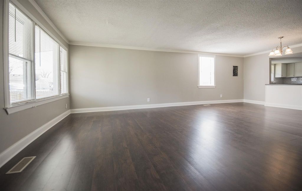 Large living area with wood floors! - 725 North Academy Street