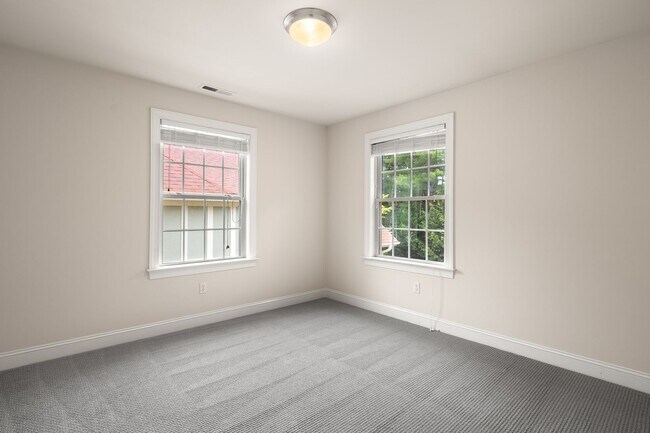 Building Photo - Five-Bedroom Tudor Home with Main-Level Primary Suite in Albemarle Reserve
