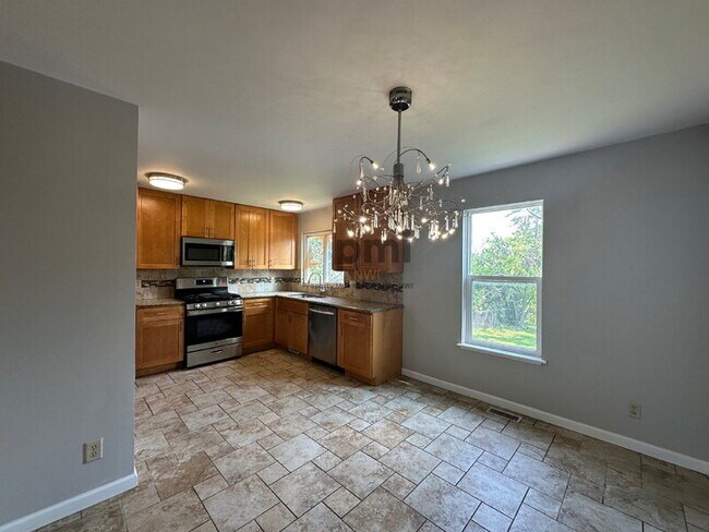 Building Photo - 1031 W 59th Pl