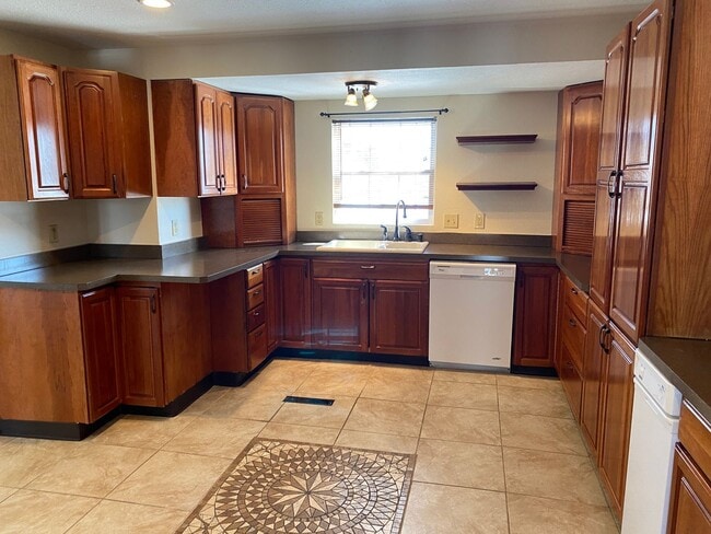 Building Photo - Great corner lot home backing up to open s...