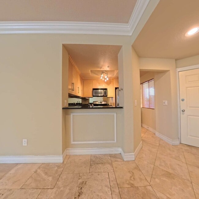 Building Photo - Luxury Mid-Rise | Guard Gated | Underground Garage Area | Resort Style Amenities