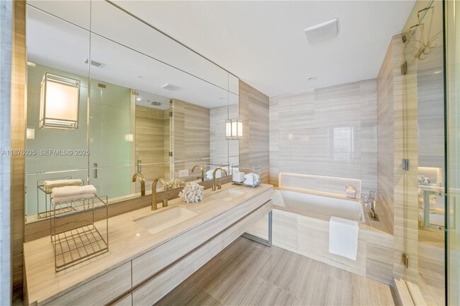 Building Photo - 18975 Collins Ave