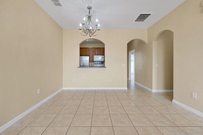 Building Photo - "Charming 3-Bed, 2-Bath Condo Oasis in Orlando – 1,000 Sq Ft of Comfort!"