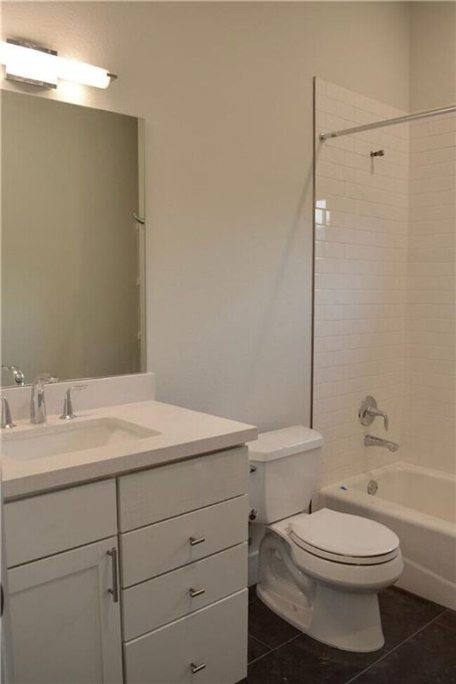 Building Photo - Modern Newer Townhome Across Frm UT