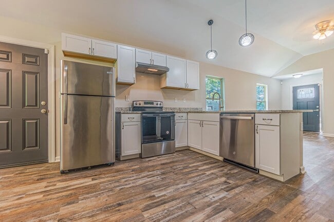 Primary Photo - Spacious Four-Bedroom Two-Bath Home on One...