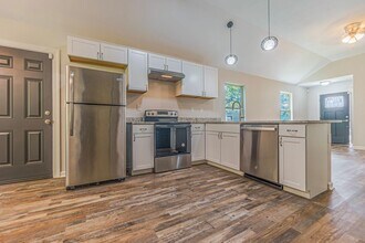 Building Photo - Spacious Four-Bedroom Two-Bath Home on One...