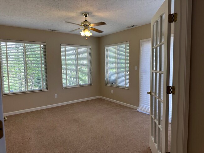 Building Photo - Well-Maintained Condo with 2 Bonus Rooms & Attached 2-Car Garage