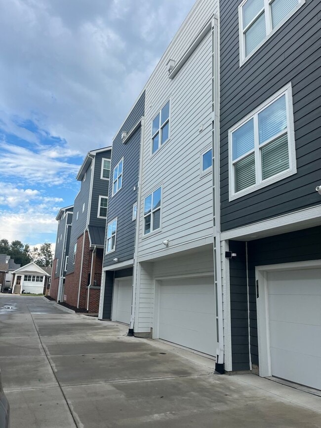 Building Photo - New Construction, 2 bed, 3 bath Row Home, with 2 car garage, fireplace, and rooftop deck!