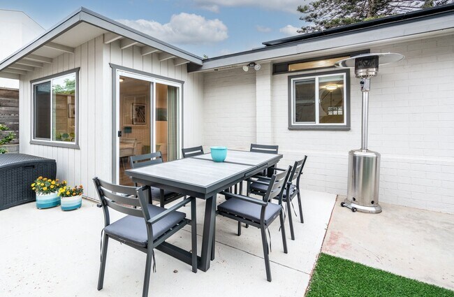 Building Photo - Enjoy stunning sunsets and beach living at its finest, Short Walk to Beach