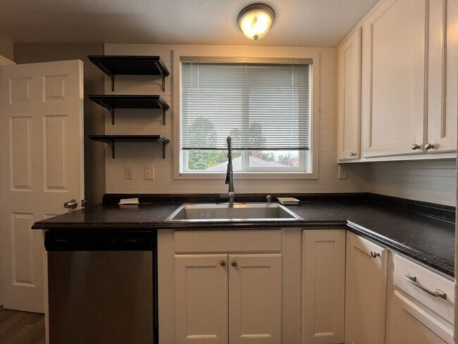 Building Photo - Three-Bedroom Home with Updated Kitchen & Vaulted Ceilings