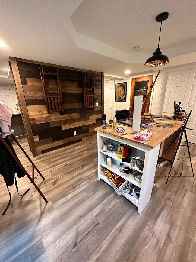 Building Photo - Dream Home in Highland, Michigan: Your Private Oasis on 5 Wooded Acres