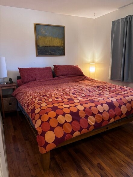 Furniture not included, but this shows how a king size bed fits in Bedroom #1 - 4808 SE Salmon St