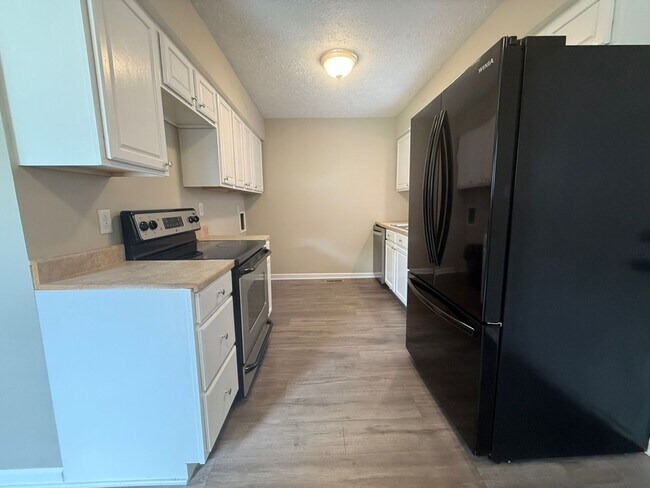 Building Photo - Newly rehab, three bedroom, one bath and Christian Park with a fence yard.