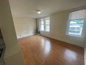 Building Photo - Renovated 1  bed , Sunny and Spacious, Utilities and laundry Inc Close to train 1 free Month