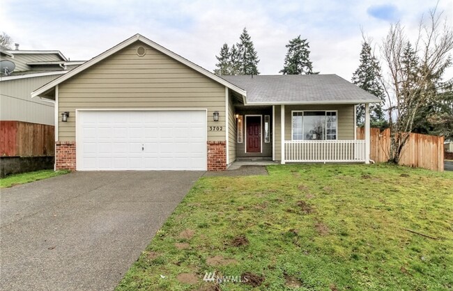 Main exterior. Now has garden and new roof and gutters - 3702 232nd Street Ct E