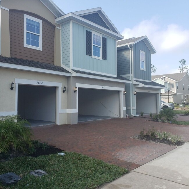 Building Photo - Like new spacious Townhome in Wesley Chapel! 3bedrooms/2.5 bathrooms/2 car garage