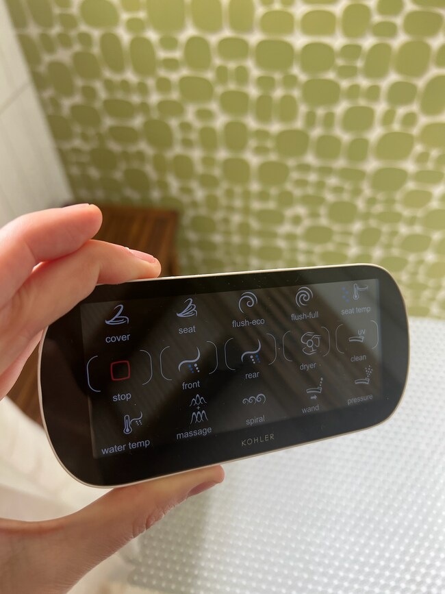 Bidet toilet remote. This toilet is next level. - 37 Alma St