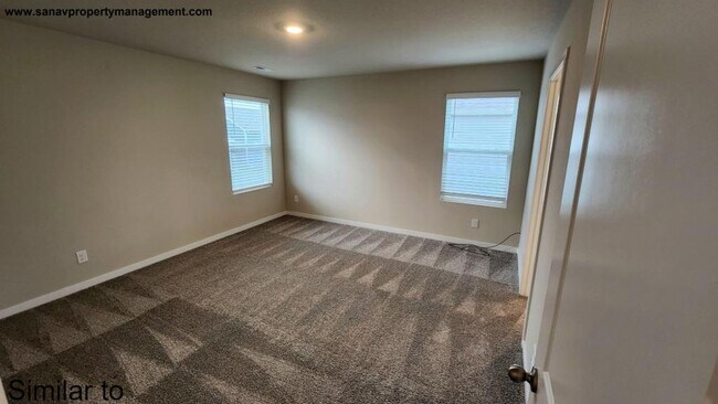 Building Photo - "Modern Luxury: Spacious 4-Bedroom Home with Open-Concept Design"