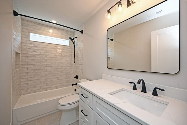 Building Photo - Stylish, Sustainable & Low-Maintenance Liv...
