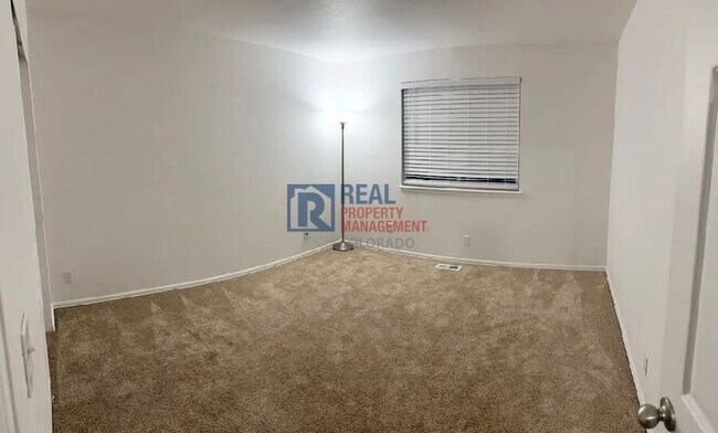 Building Photo - 2116 E 103rd Ave