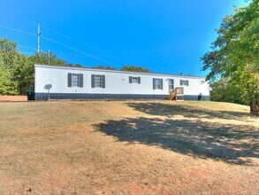 Building Photo - 3bed/2bath Mobile Home Available on 1.3 Acres in Noble!