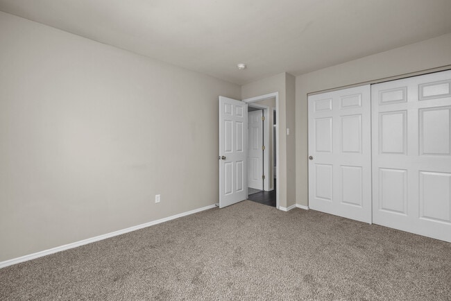 Two Bedroom Garden Partial Remodel with Fireplace | Bedroom - Woods Mill Park Apartments & Townhomes