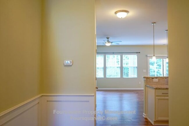 Building Photo - **Coming Soon: July 16, 2026: Charming End-Unit Townhome with Bonus Room, Screened Porch & 2-Car ...