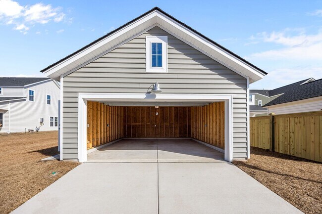 Building Photo - This brand-new home makes a statement from the moment you arrive!