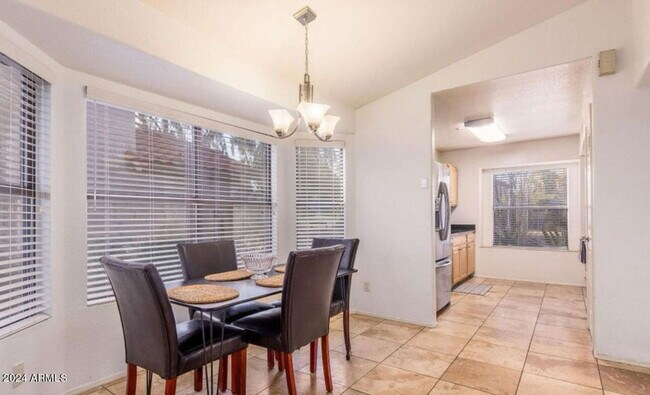 Building Photo - 8813 E Charter Oak Dr